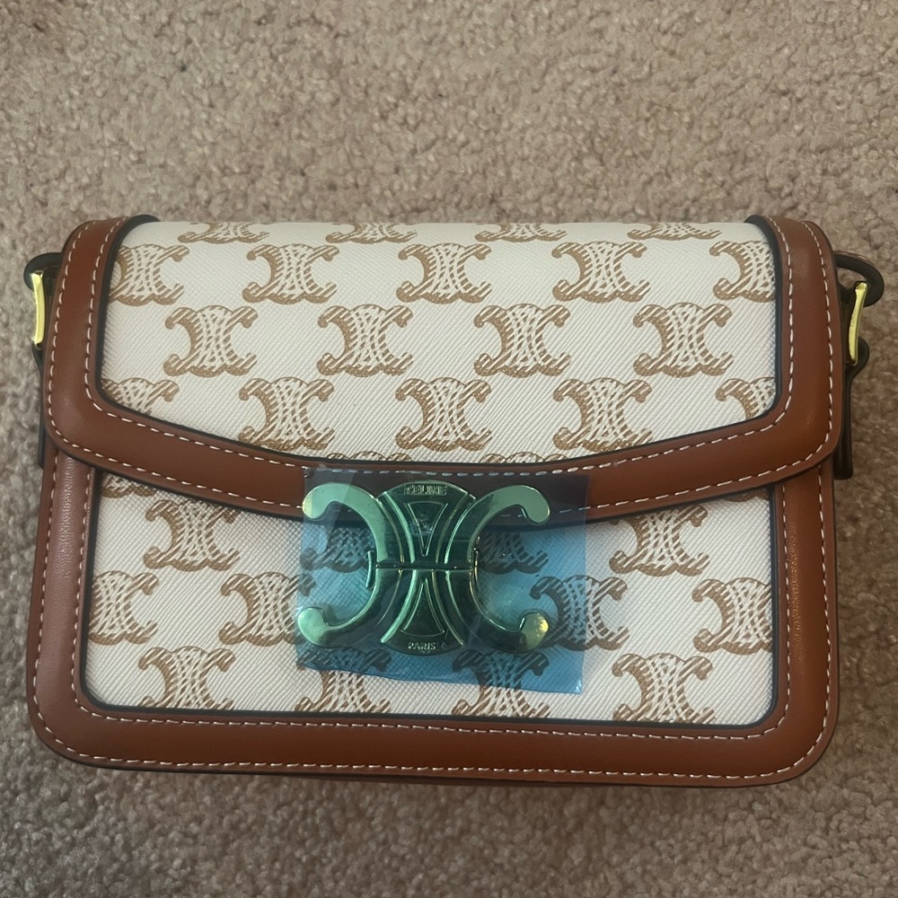 Celine white and brown crossbody bag.